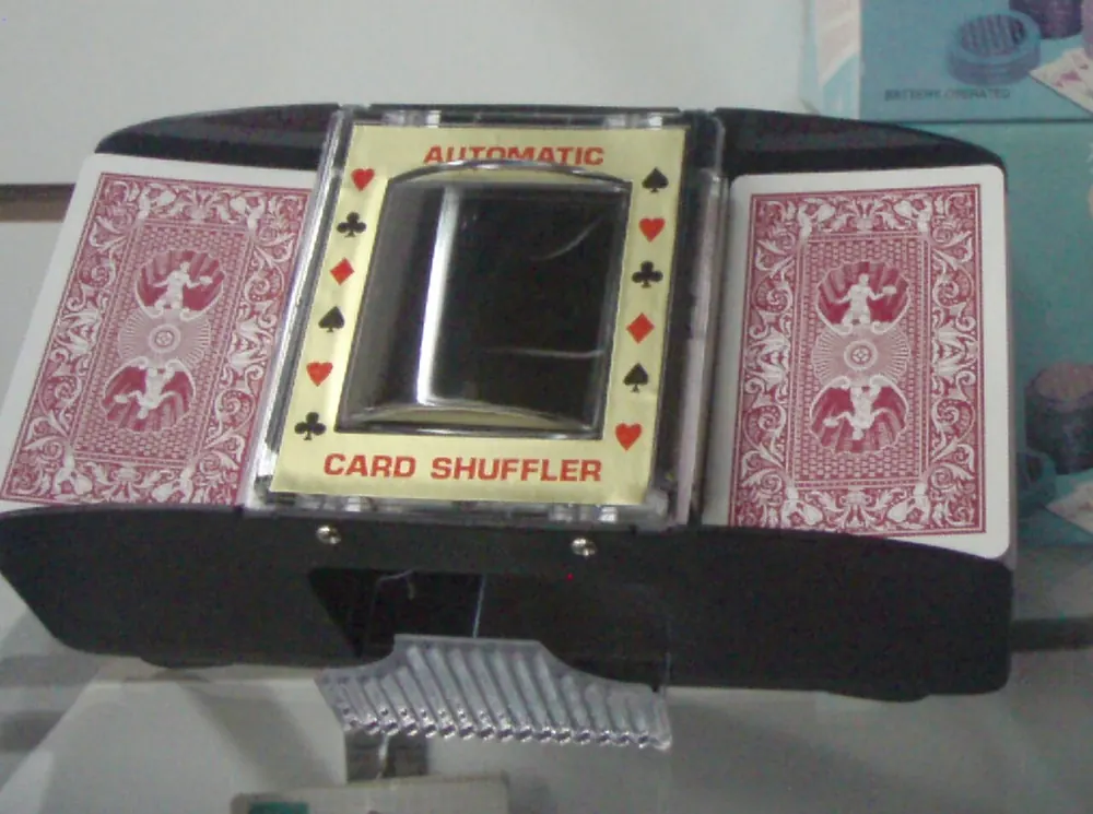 Vintage card shuffler with a deck of cards, fast like CS2 live betting
