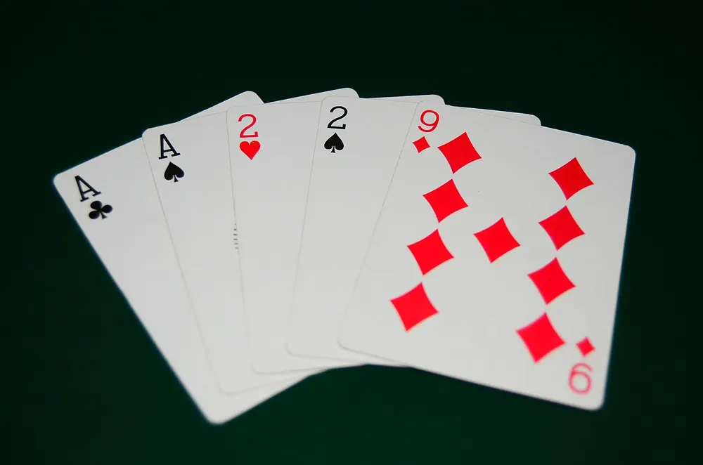 Poker hand of two pair, aces and twos
