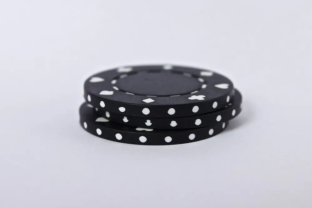 Stacks of poker chips, the more you wager the more you level up