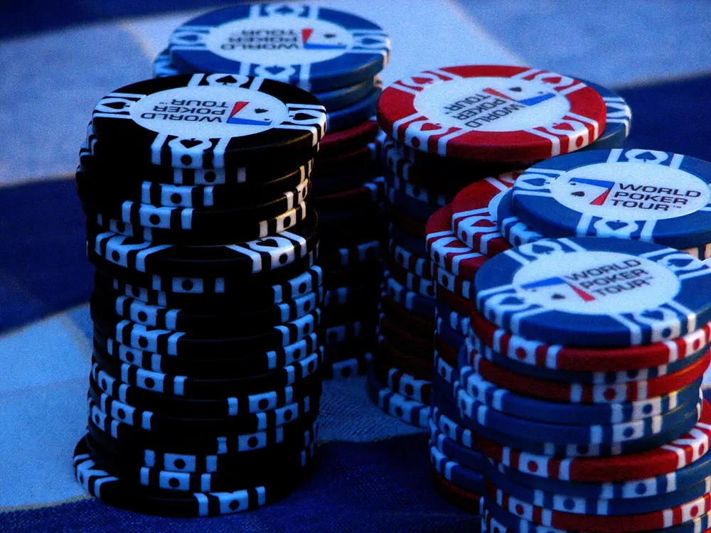 Tall towers of red and blue poker chips