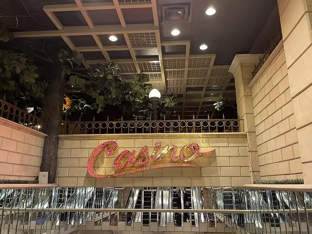 Interior of a casino floor with slot machines