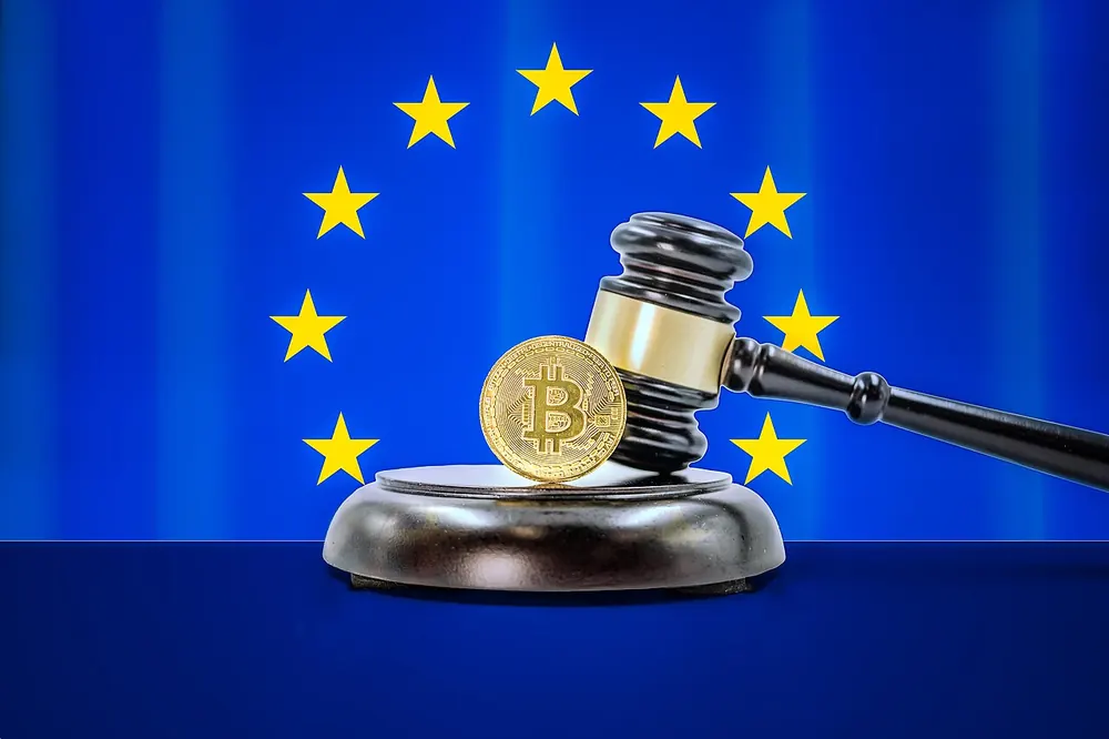 Bitcoin coin with a judge's gavel and EU flag