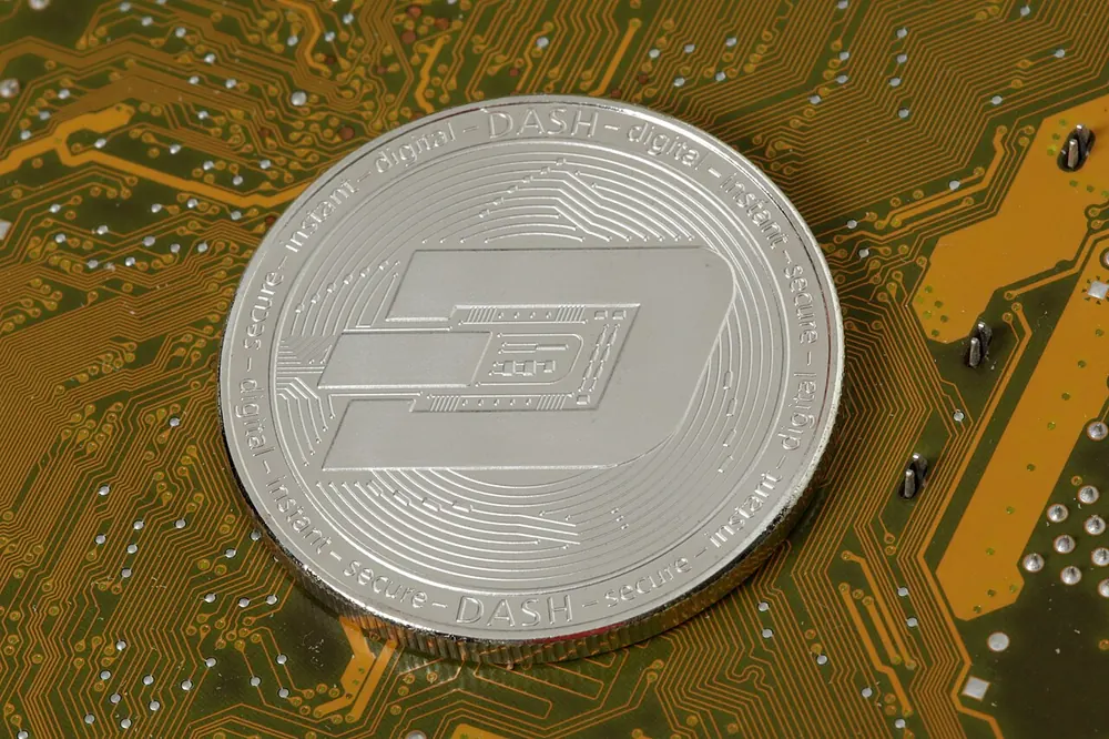 Silver crypto coin on a circuit board, weighing whether the Armory Pass is worth it