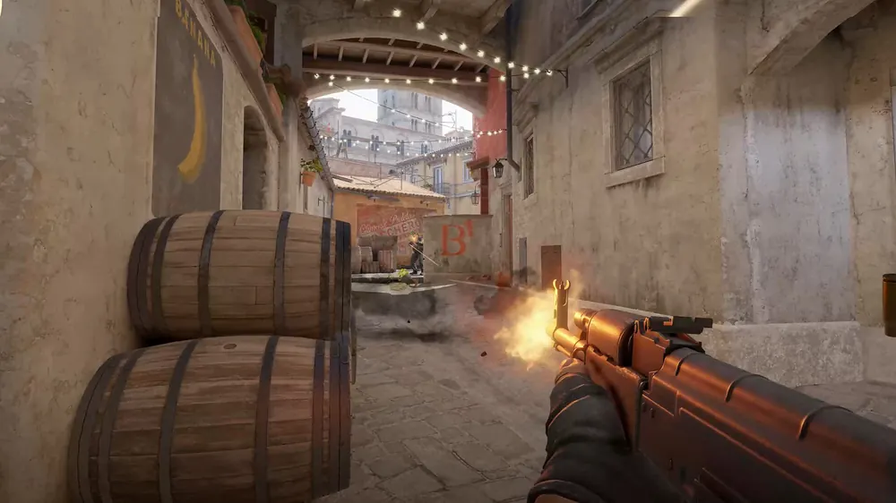Counter-Strike 2 screenshot of an AK-47 firing down a barrel-lined alley, for this guide on steam buy order cs2