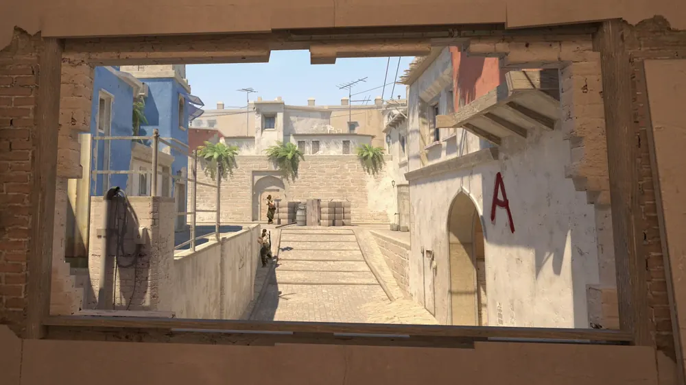 Counter-Strike 2 screenshot of a view through a window toward a bombsite, for this guide on cs2 discontinued cases