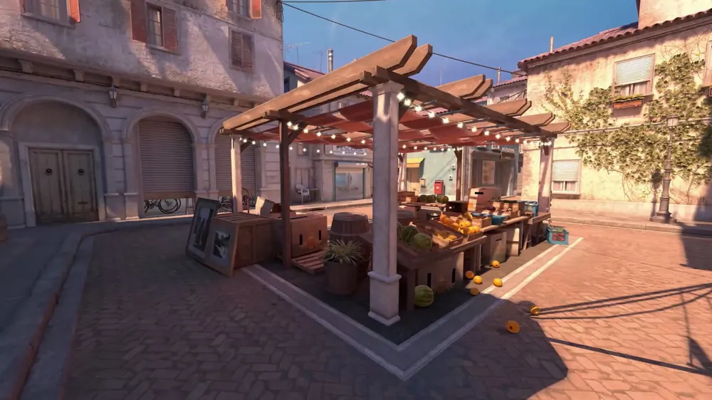 Counter-Strike 2 screenshot of an outdoor market stall in a sunny plaza, for this guide on buy cs2 skins steam wallet