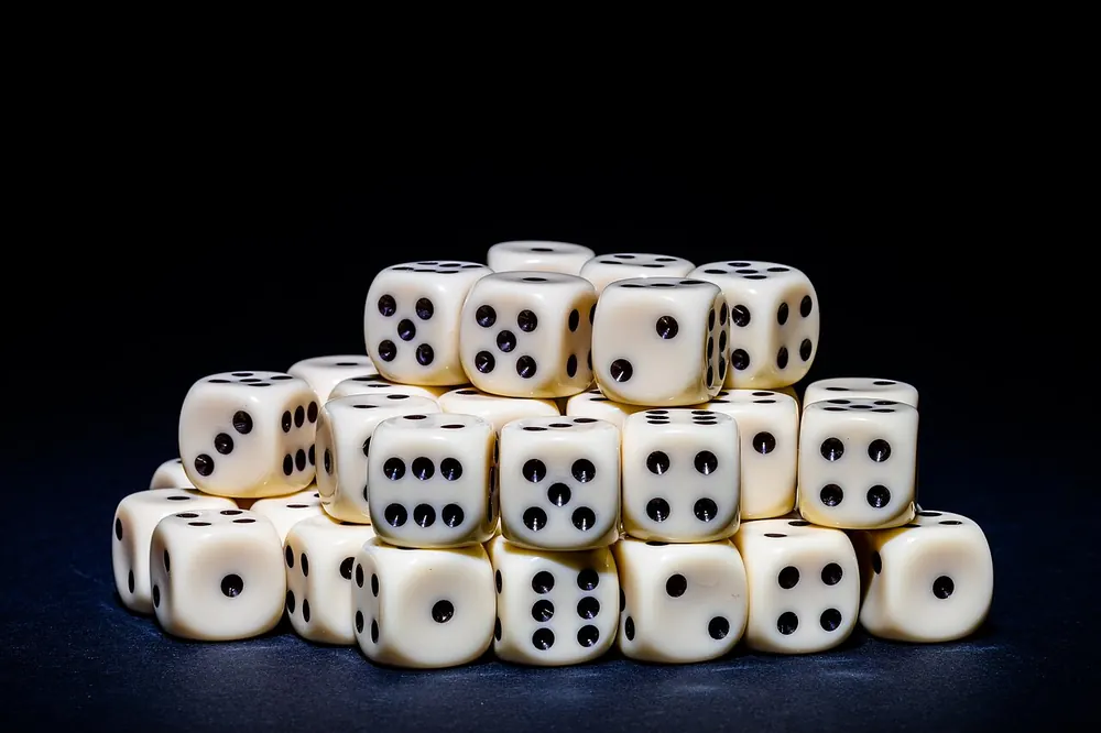 Pile of white six-sided dice