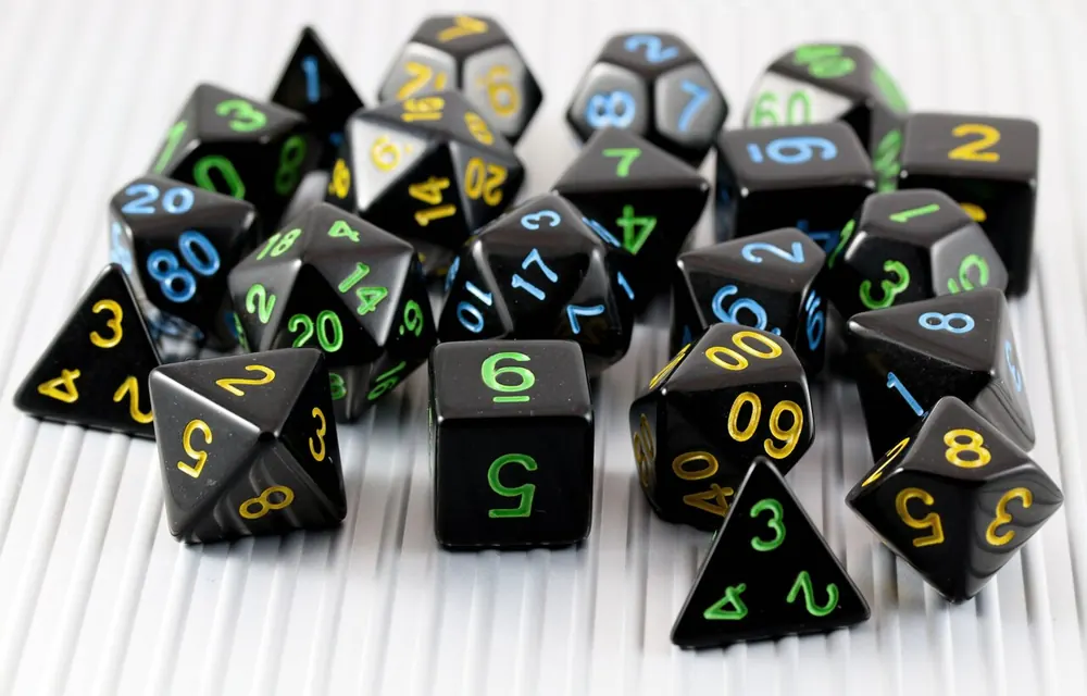 Set of black polyhedral game dice