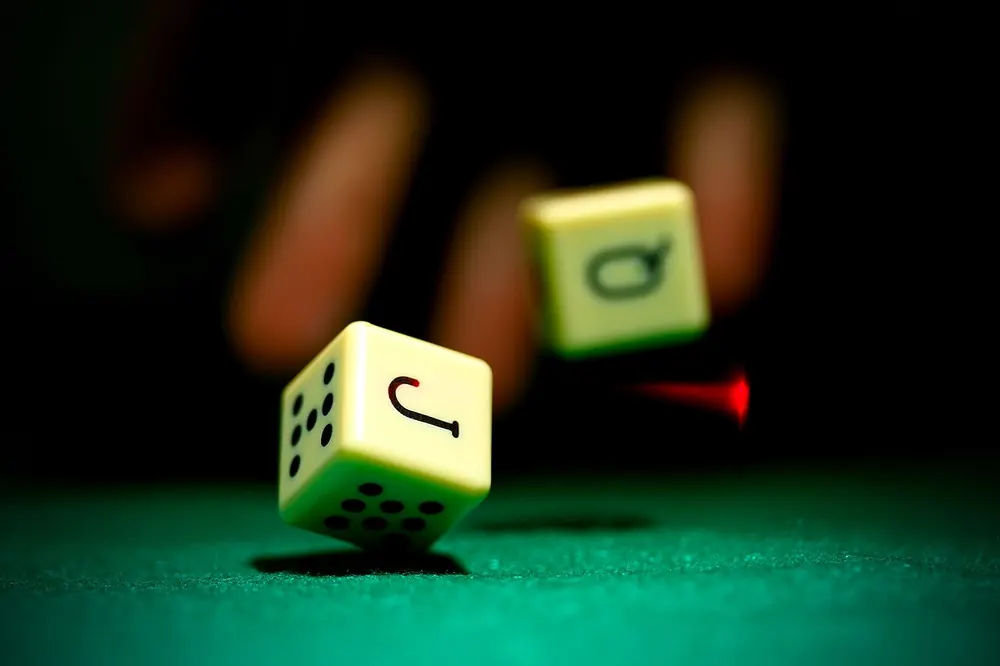 Macro shot of dice tumbling mid-roll