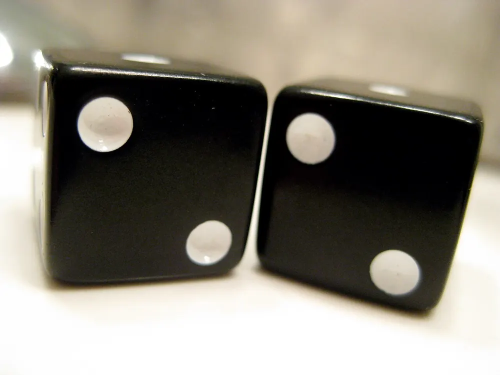 Two black dice in close-up