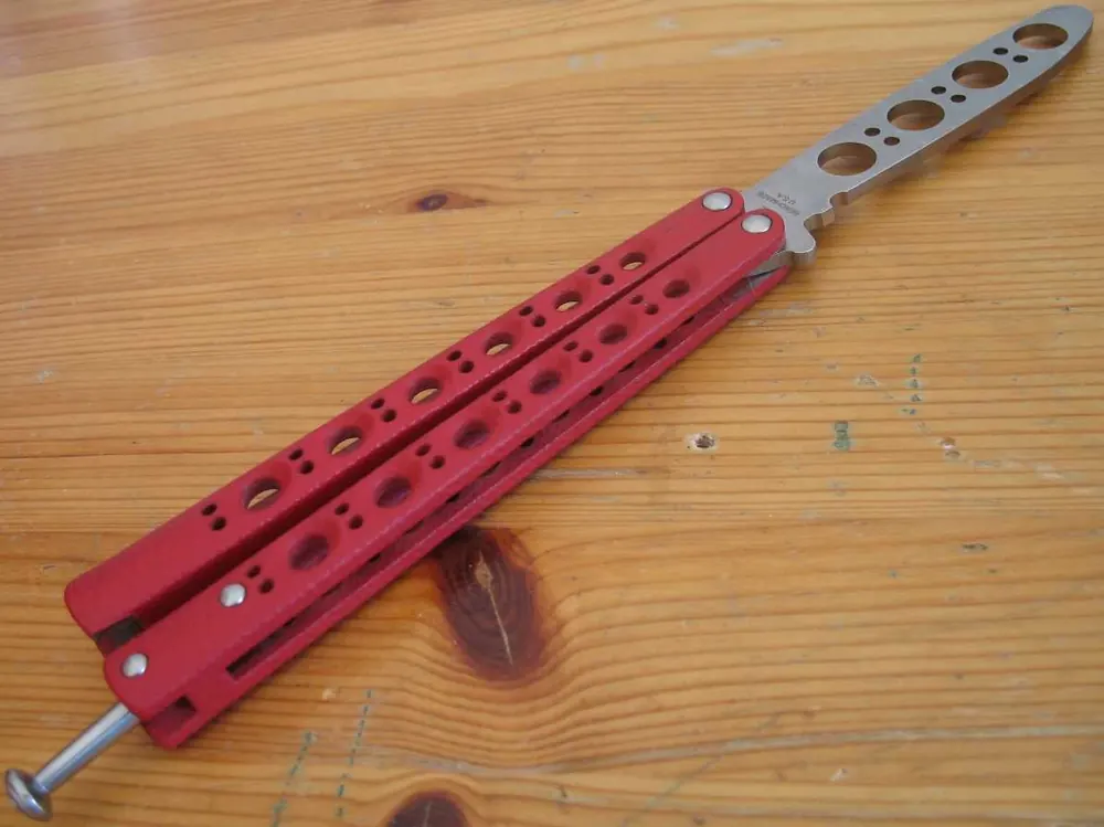 Red balisong butterfly knife, the shape behind the CS2 Butterfly Knife
