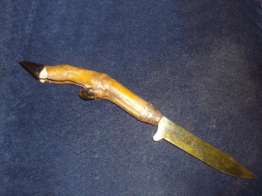 Hunting knife with a deer hoof handle
