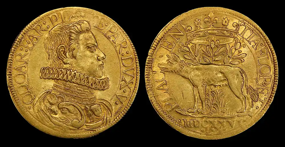 Antique gold coins on a dark background