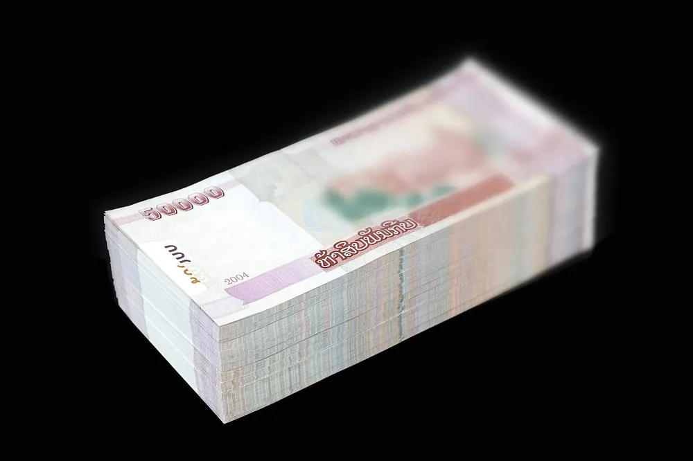Big stack of banknotes, verifying your account before cashing out