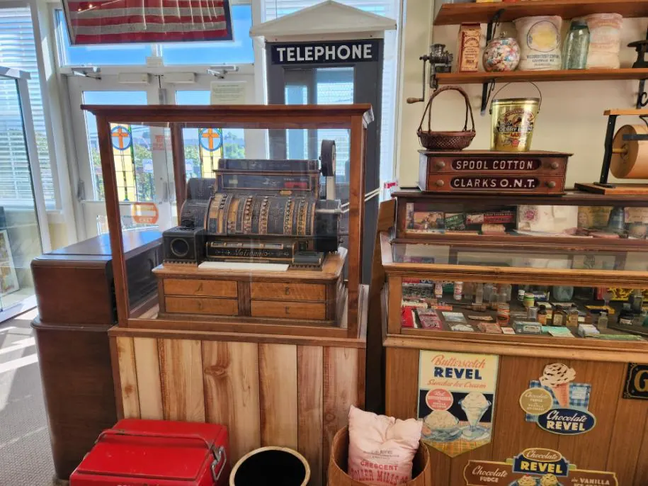 Antique brass cash register in a museum, old-school CS2 skin price checking