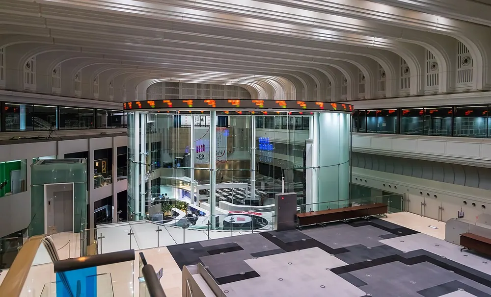 Trading floor of a stock exchange with screens and desks, like a big CS2 skin trading site