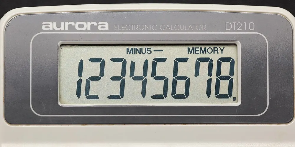 Calculator showing 12345678, doing the math on whether StatTrak is worth it