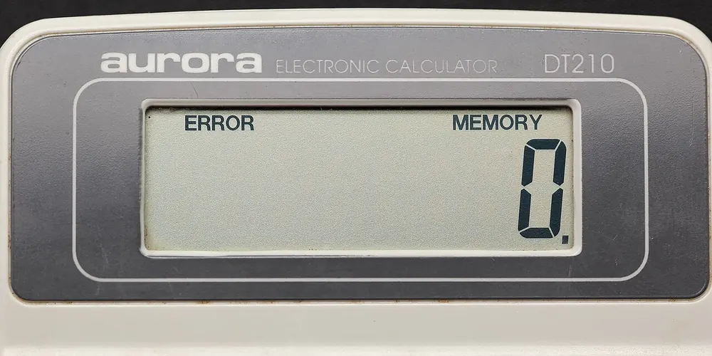 Electronic calculator showing zero, counting free coins with no deposit