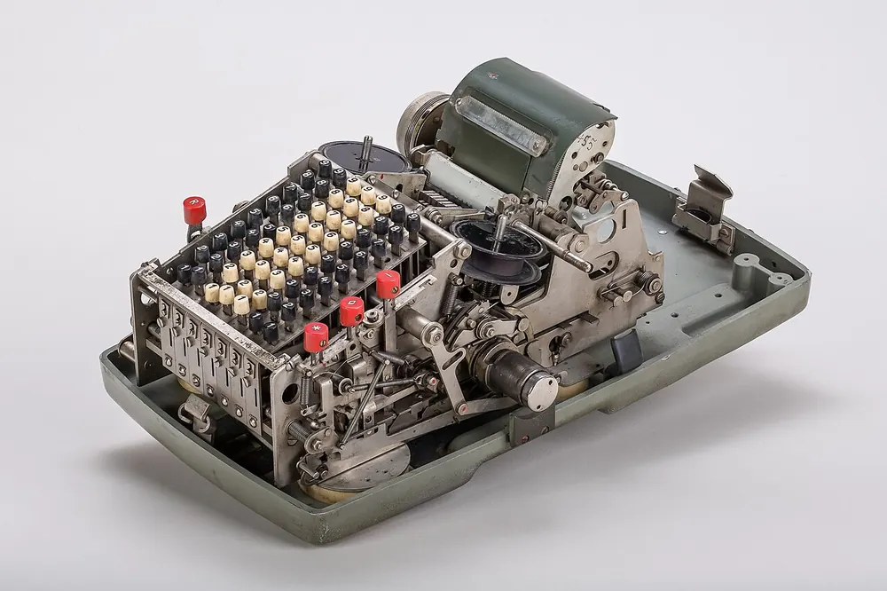 Vintage mechanical calculator with crank and dials